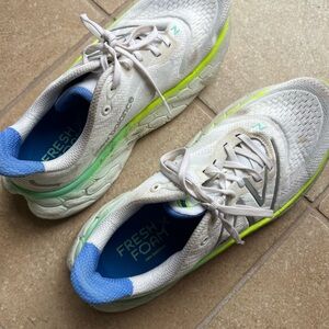 New Balance White Running Shoes with Neon Green and Blue Accents